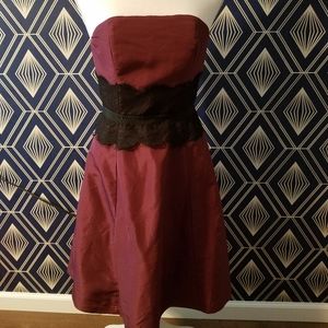 Strapless plum party dress with black lace